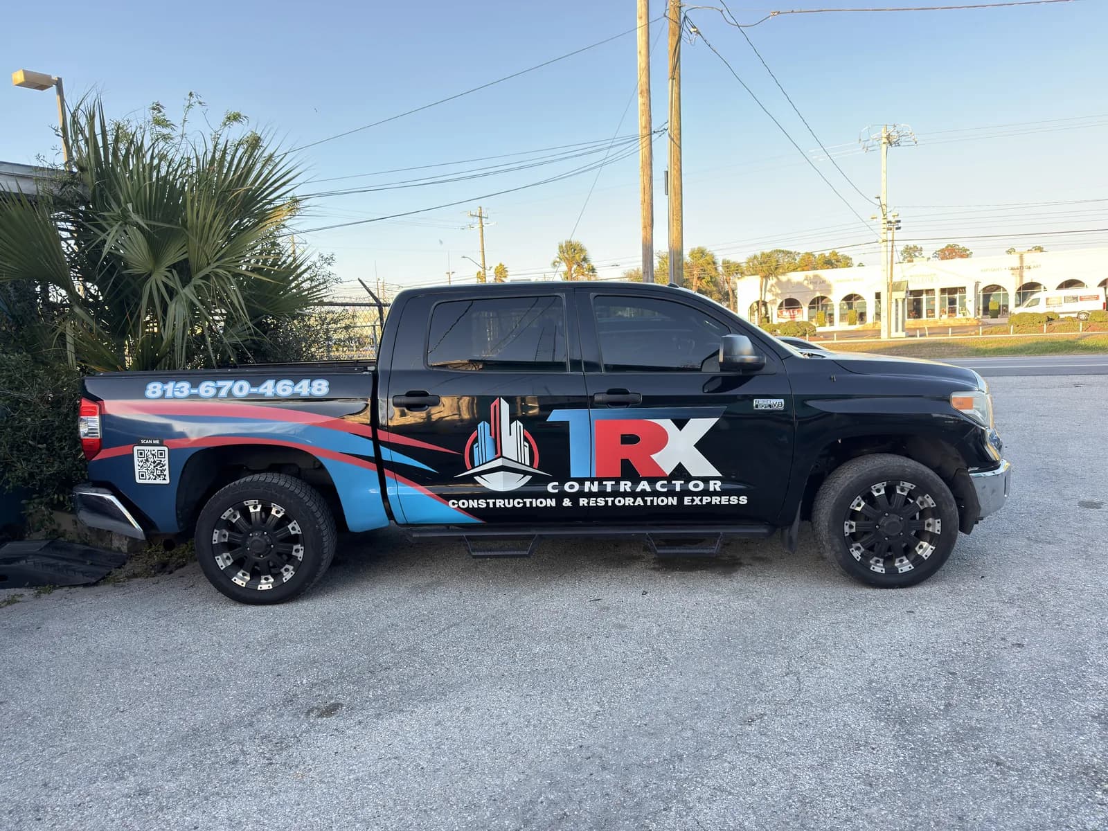 Pickup truck with a partial wrap for a contracting company