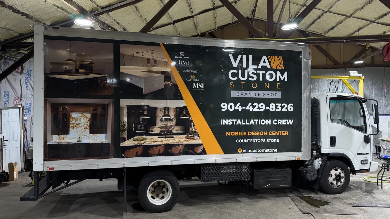 Box truck wrapped as a mobile design center for a countertop store